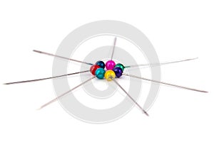 coloured sewing pins on a white background isolated