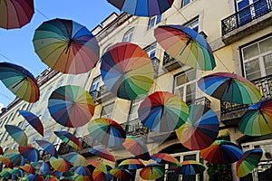 Coloured umbrellas above the Pink Street in Lissabon