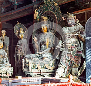 Coloured woodcarving sculpture in the Mahavira Hall (Hall of Ceremony) of Down-Huayan temple