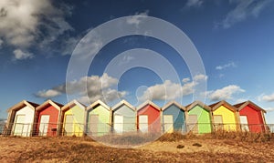 Colourful beach huts photo