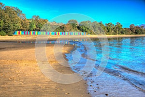 Colourful beach huts Llanbedrog Llyn peninsula Wales