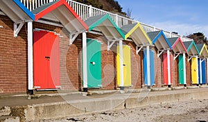 Colourful beach huts, Swanage photo