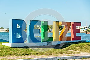 Colourful Belize city sign at sunny day nobody close up photo