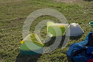 Colourful bibs left on a football pitch, ready for the next training session to come. photo