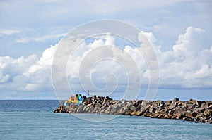 Colourful blocks on a harbour breakwater