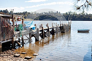 Colourful boat sheds on the edge of Cornelian Bay