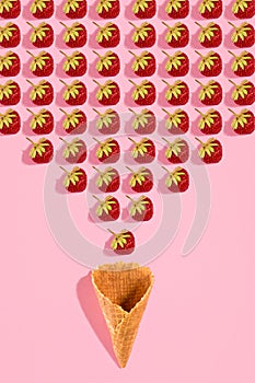 Colourful bright pattern with ripe strawberry. Top view. Pink background