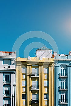 Colourful building facades in Campo Pequeno, Lisbon, Portugal on a sunny day photo