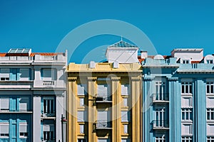 Colourful building facades in Campo Pequeno, Lisbon, Portugal on a sunny day photo