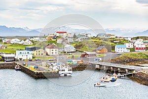 Colourful buildings around a harbour in a fishing village in Iceland