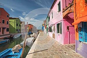 Colourful buildings lining cannal, Island of Burano, Venice Ital