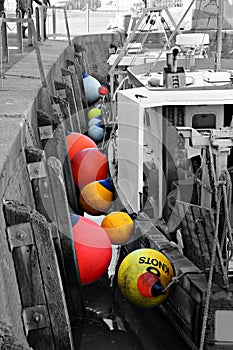 Colourful buoys in whitstable harbour