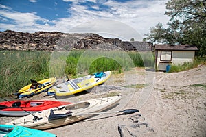 Colourful canoes along the lake