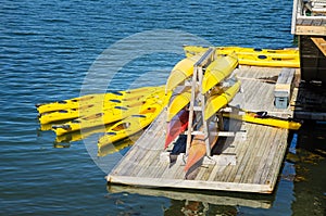 Colourful Canoes on a Pier