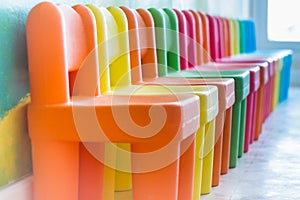 Colourful chairs in the playroom