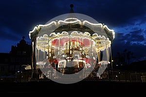 Colourful children\'s carousel in an amusement park. Gdansk, Poland