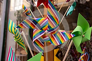Colourful children`s windmill outside a store in Porto, Portugal