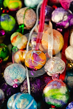 Colourful Christmas baubles. Felted wool, ribbons and jingle bells.