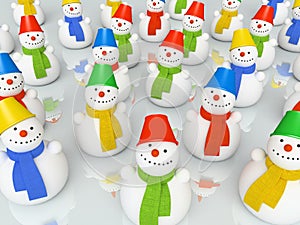 Colourful christmas snowmans in scarfs on skating rink