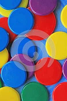 Colourful circles pattern on a blue background close up
