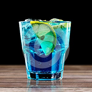 Colourful cocktail on the black background