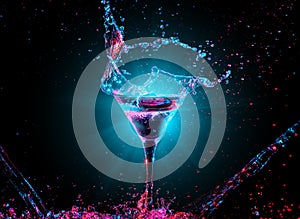 Colourful cocktail in glass with splash