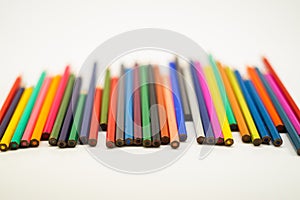 Colourful colour pencils isolated on white background.Close up