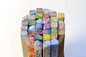 Colourful crayons on white background