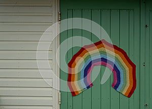 Colourful crocheted rainbow, a symbol of gratitude to the National Health Service NHS during the Coronavirus pandemic in the UK.