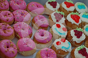 Colourful cupcakes and doughnuts