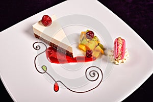 Colourful dessert at restaurant, mix fruits cake and macaron