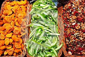 Colourful display of various candied fruits, and mixed nuts for sale