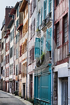 Colourful doors and window shutters in Bayonne France