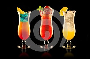 Colourful drinks on black background