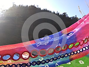 Colourful dupatta flying in mountains. photo