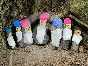 Seven dwarfs in the forest handcrafted by children photo