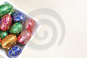 Colourful easter eggs in bowl