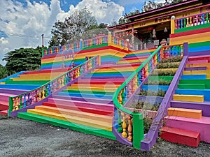 Colourful entrance stairs of Yue Shan Gu Miao Temple with bright & striking colours at Kuala Kubu Bharu Baru, Selangor, Malaysia