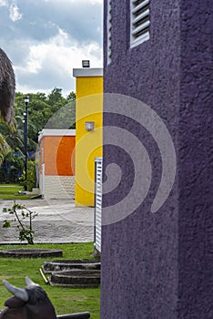 Colourful exteriors outside Puerta Maya cruise port Cozumel