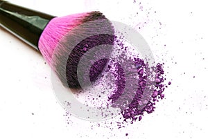 Colourful eyeshadow powder and make-up brush