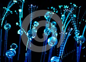 Colourful fiber optic strands or filaments creating a magic abstract fantastic background