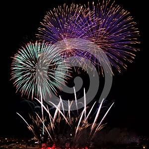 Colourful fireworks isolated in dark background close up with the place for text in Malta