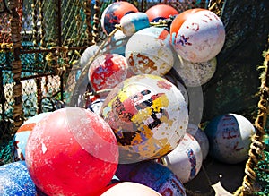 Colourful fishing buoys on a boat