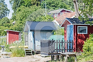 Colourful fishing cottages on a beach