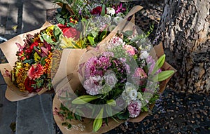 Colourful Flower Arrangement wrapped in brown paper