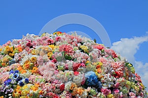 Colourful flower bed in blue sky