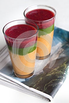 Colourful Fruit Smoothies on Newspaper