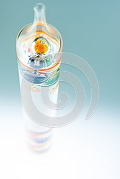 Colourful Galileo Thermometer Abstract on Blue