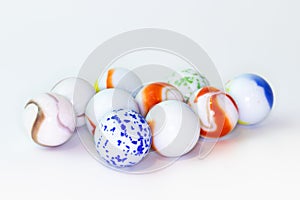 Colourful glass marbles isolated on white background
