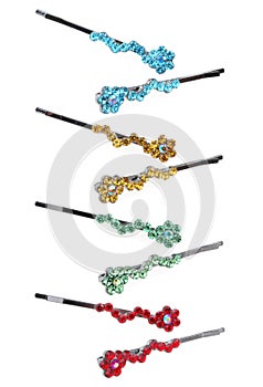 Colourful hairpins on a white
